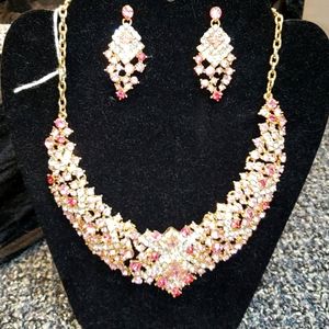 Gold and pink necklace and earrings